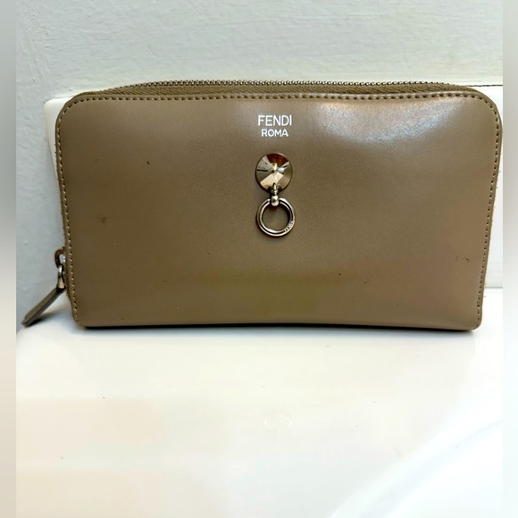 Fendi Handbags - FENDI Roma beige leather zippy wallet